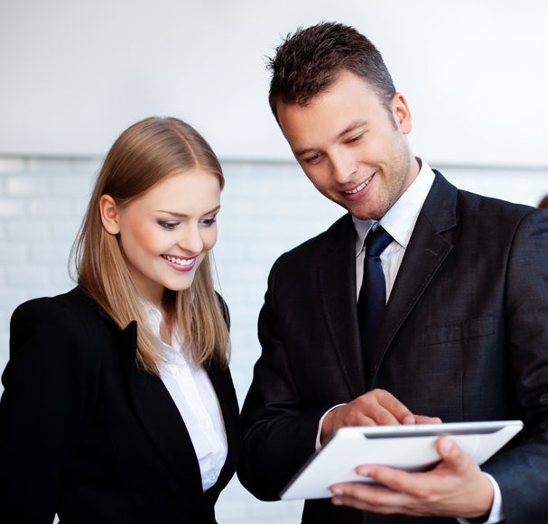 Business owners discussing business insurance in Toledo, OH